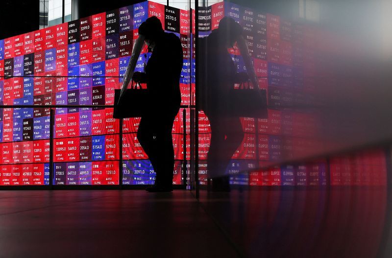 Shares and bonds surge, oil slides on Iran deal