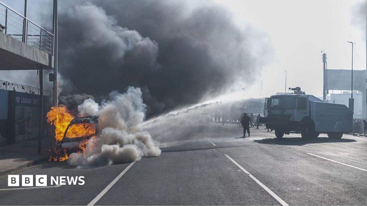 Cars torched and shops looted as anti-migrant violence erupts in South Africa