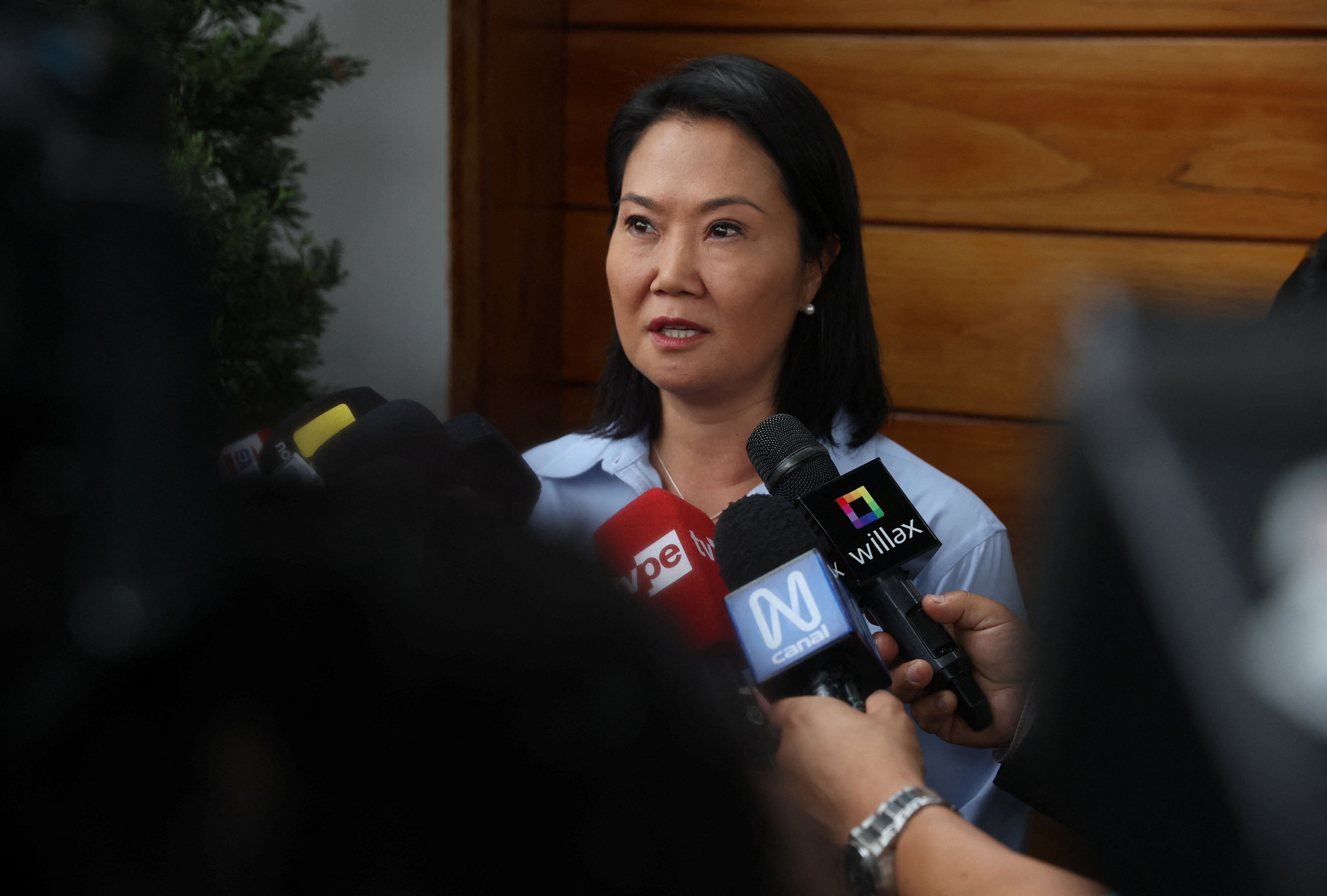 Fujimori edges back into lead in Peru's knife-edge election