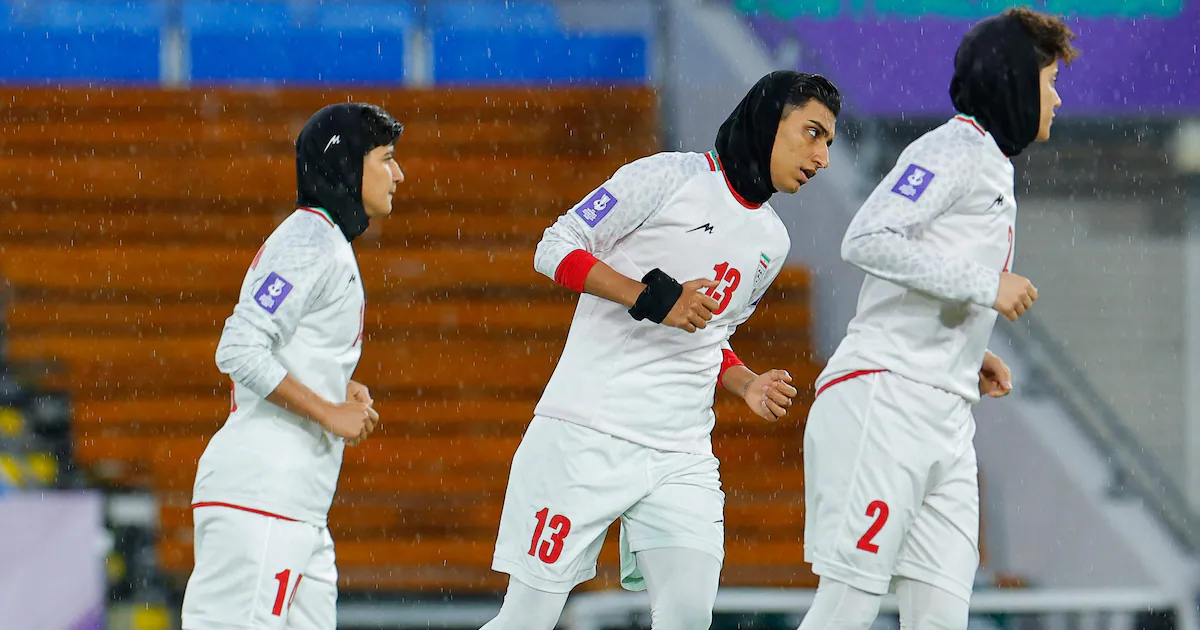 Australia urged to offer Iran women's team refuge amid fears of backlash after refusing to sing anthem