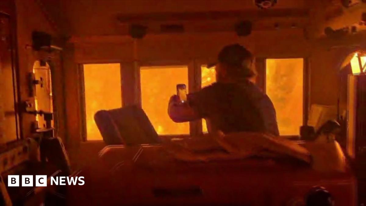 Canada wildfires leaves train 'encased in flames' as smoke from drifts towards US
