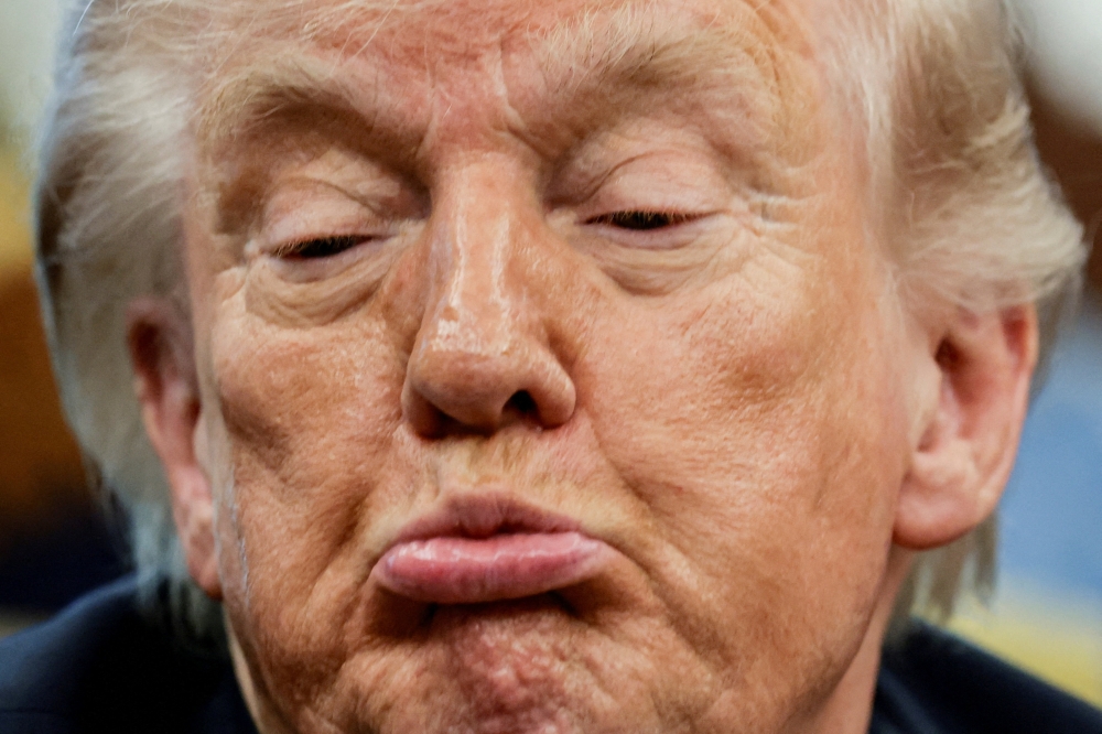 Trump weighs cutting US troops in Germany after Merz’s barb on Iran war