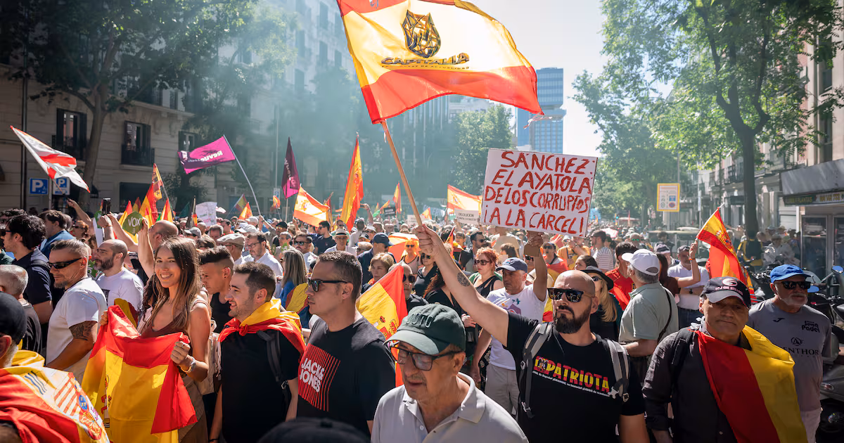 Tens of thousands march in Madrid to demand Spanish prime minister resigns