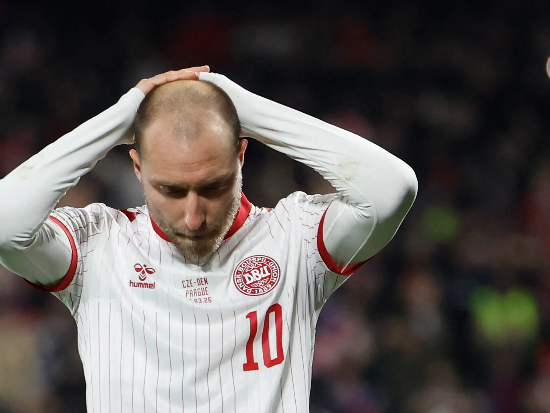 Denmark’s Christian Eriksen collapses during match with Ukraine