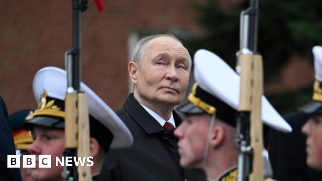 Putin denounces Nato at scaled back Victory Day parade