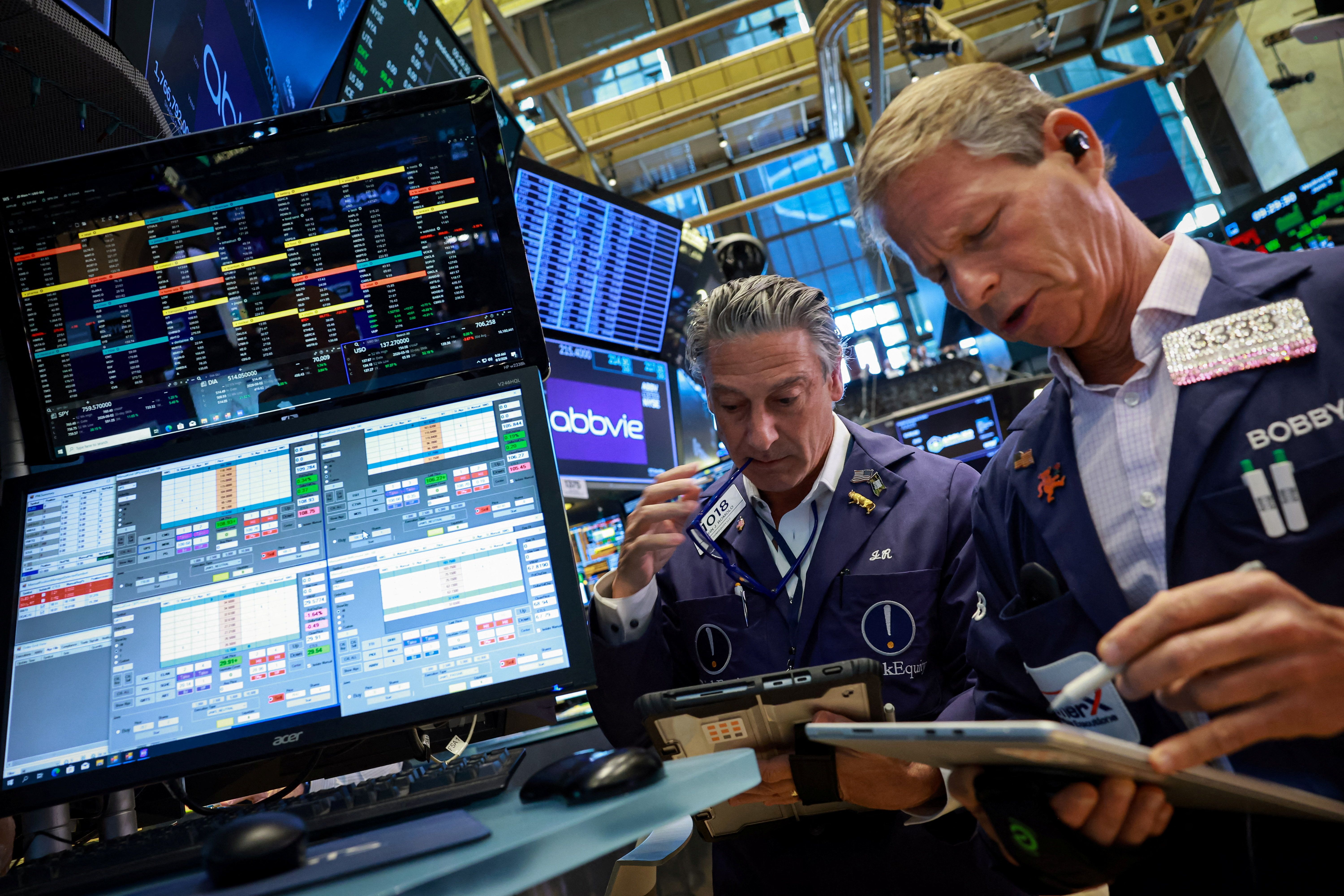 Wall Street ends sharply lower as chips slide, jobs data fuels rate hike fears