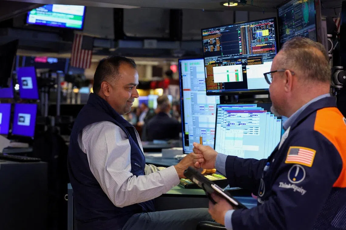 Wall St ends mixed, notches weekly gains as investors parse Middle East negotiations