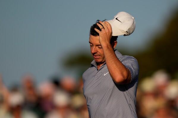 Rory McIlroy stumbles at the Masters and now shares the lead with Cameron Young