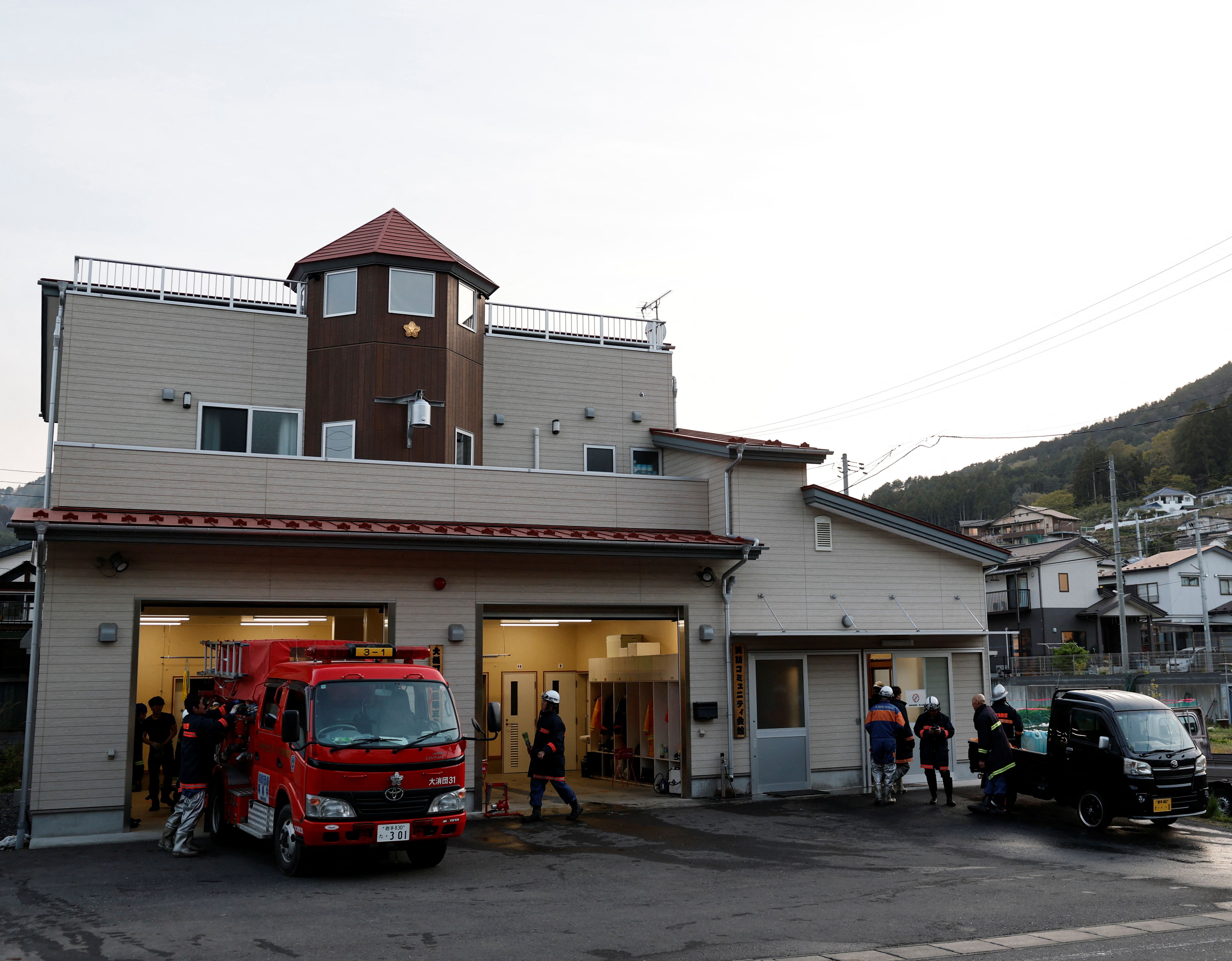 Tsunami survivor battles wildfire to protect hometown in Japan's northeast