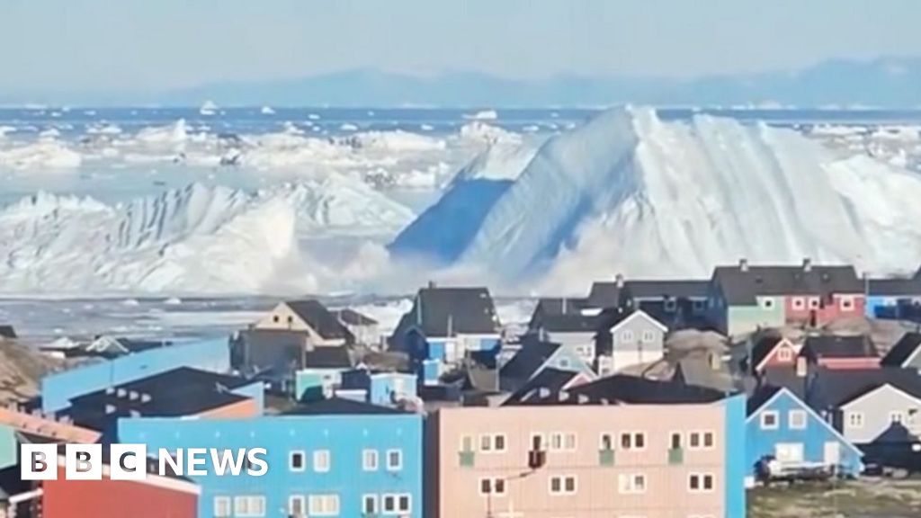 Watch: Giant iceberg turns over near  Greenland's coast