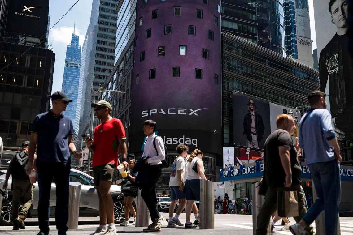 Wall Street ends higher as SpaceX's market debut dominates