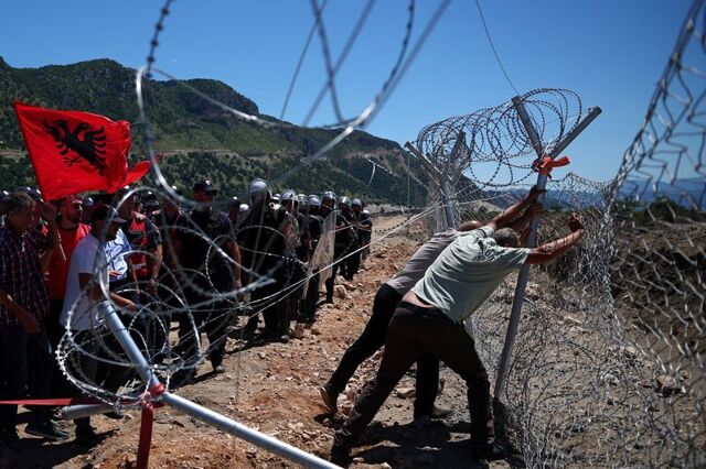Protesters tear down Albanian development site fences, amid anger over coastal projects