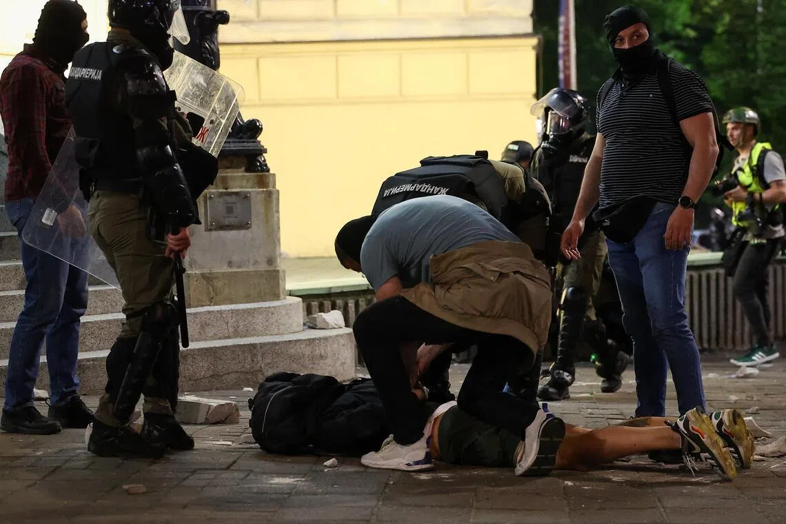 Police and protesters clash in Serbia as crowds demand president’s exit