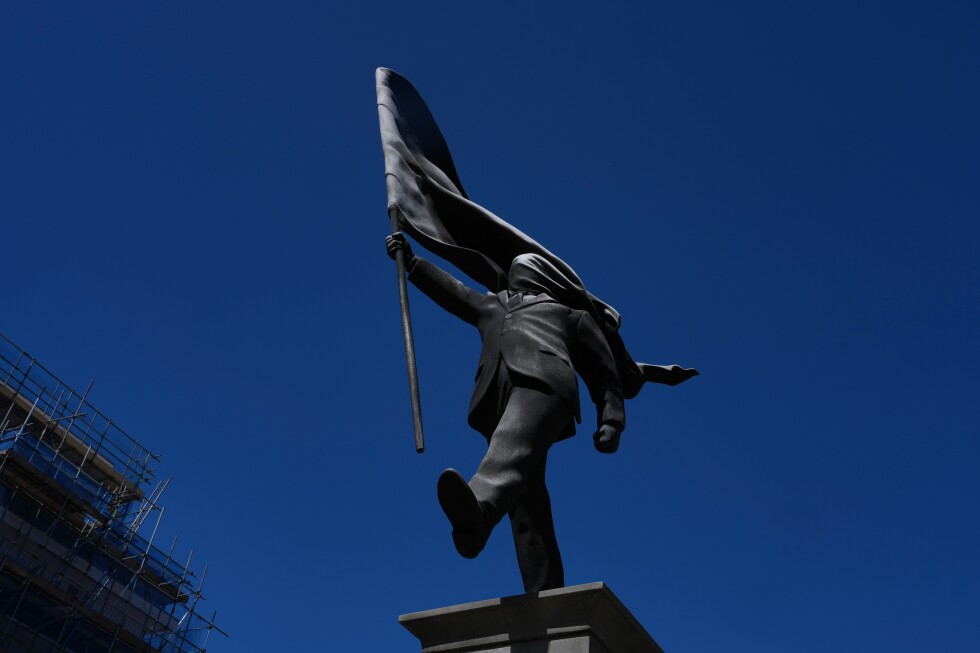 Banksy confirms a new statue in central London of a man blinded by a flag is his work