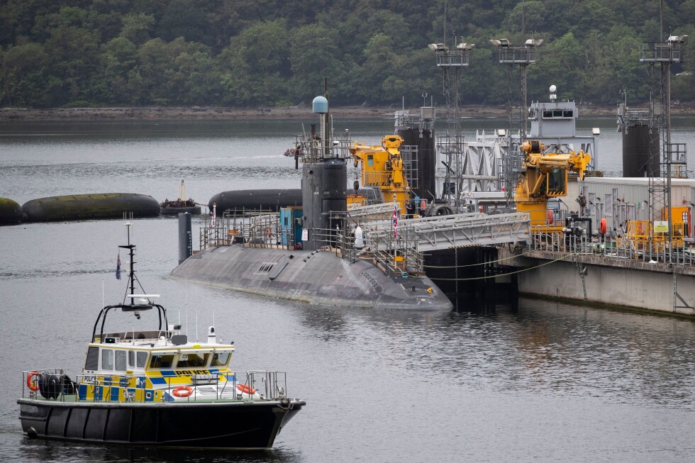 Iranian and Romanian charged after trying to enter UK's nuclear submarine base