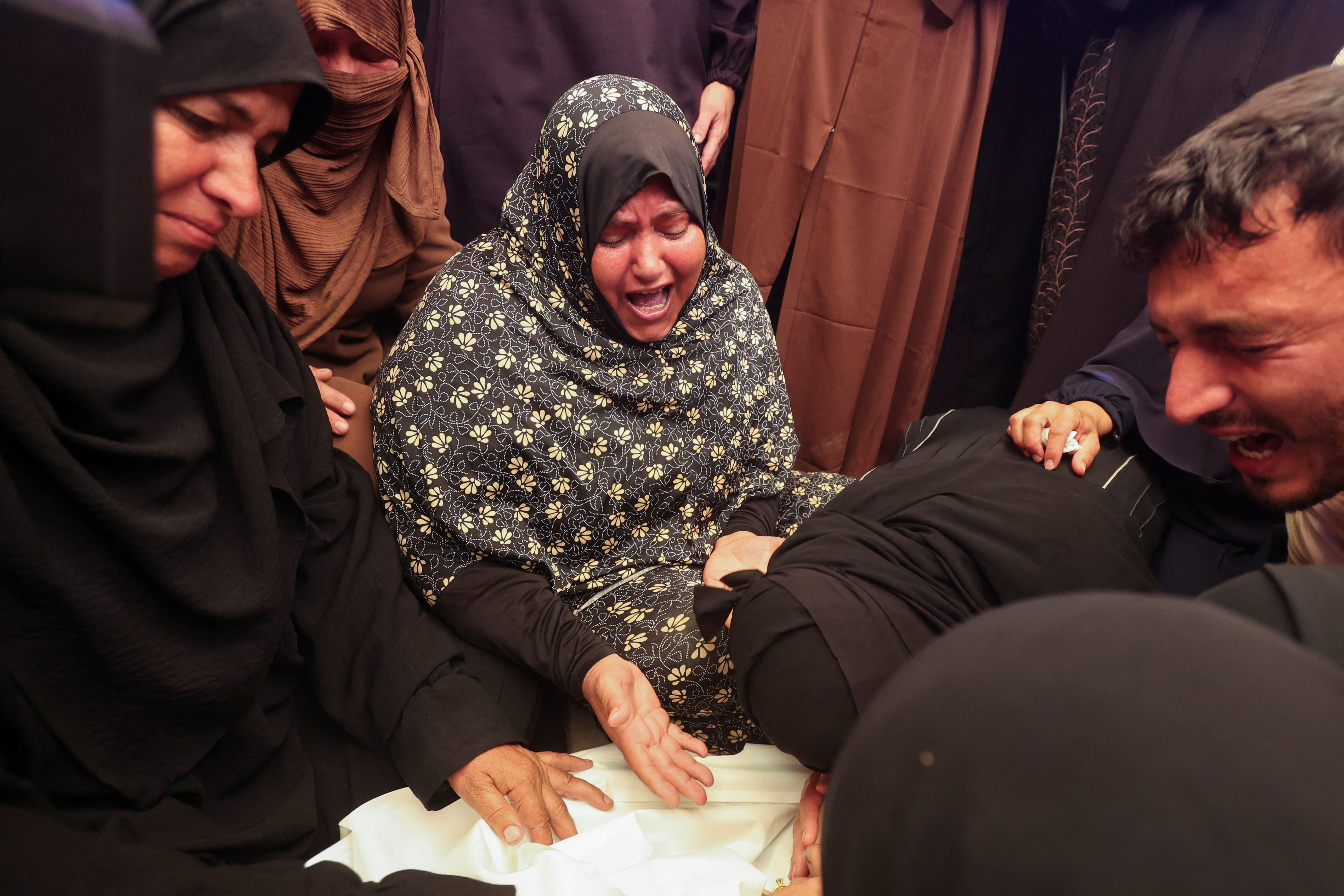 Israeli fire kills six-year-old girl and a woman in Gaza, medics say