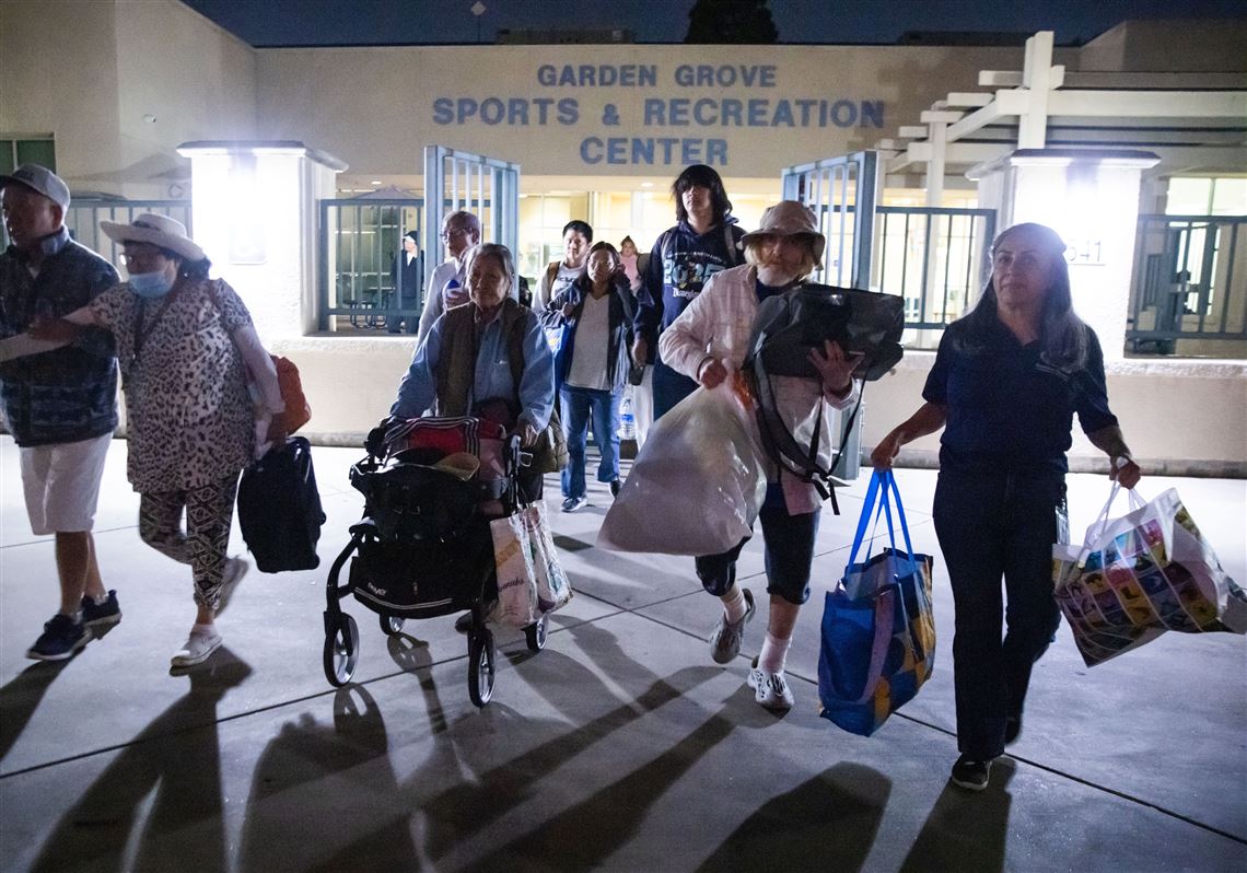 Evacuation centers fill up in southern California as efforts continue to cool damaged chemical tank