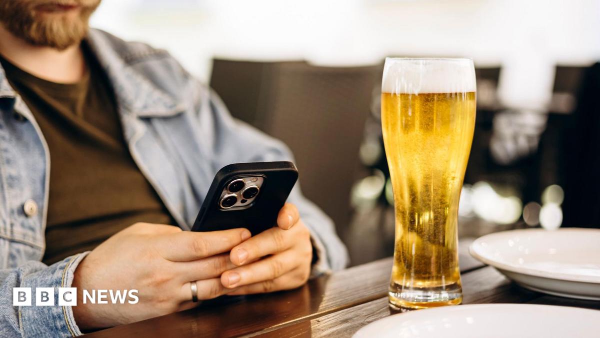 Wetherspoons bans customers playing music from phones in pubs