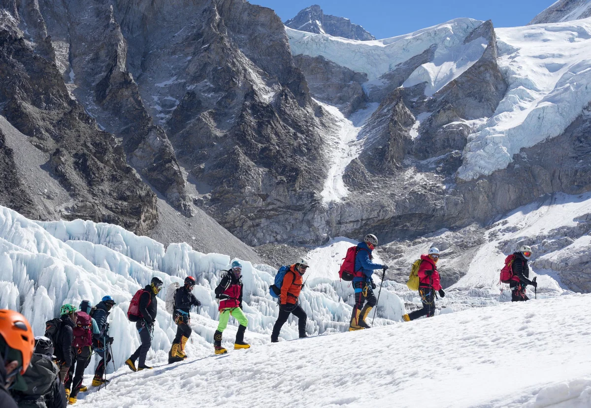 Hundreds of Everest hopefuls are waiting at base camp as glacier blocks route to summit