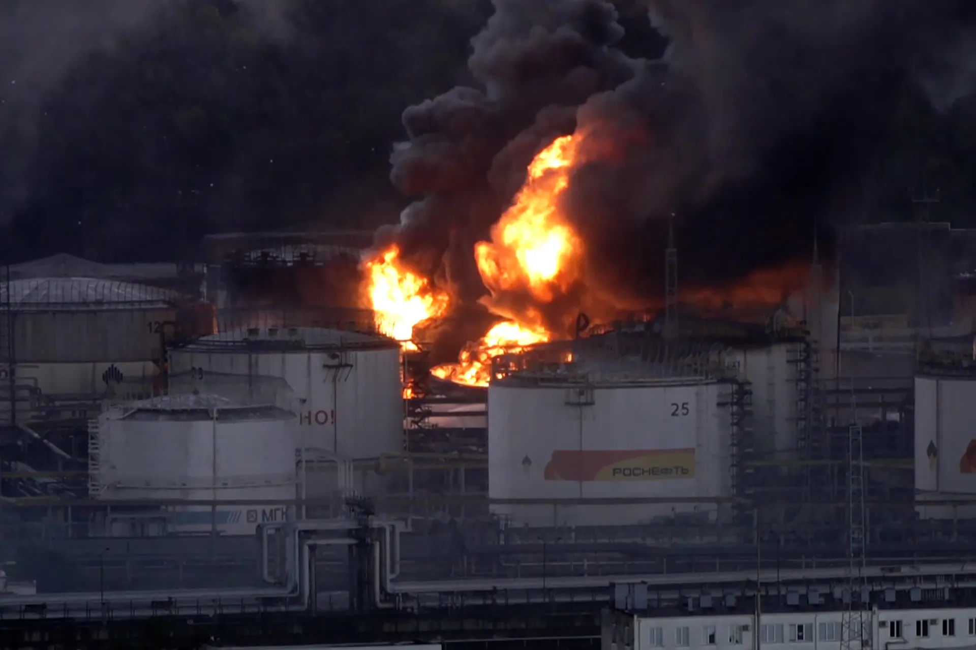 Fires ignited by Ukrainian drones rage at Russian oil refinery