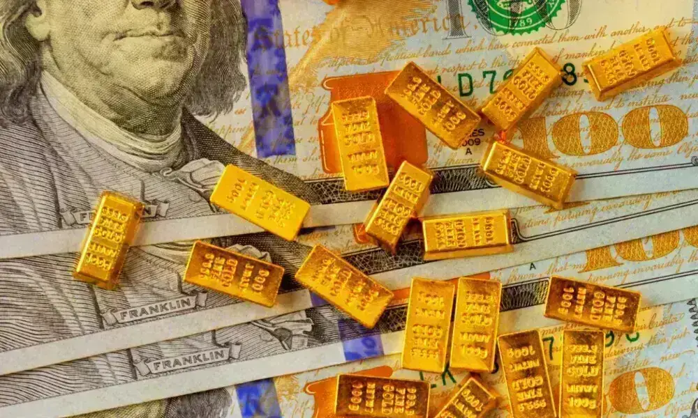 Gold falls on stronger dollar amid renewed US-Iran tensions
