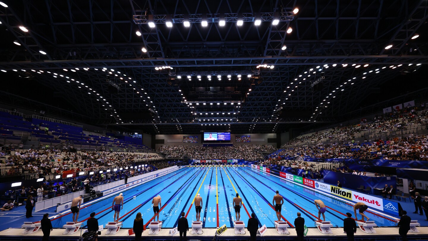 World Aquatics allows Russia, Belarus athletes to compete with flags, anthems, uniforms