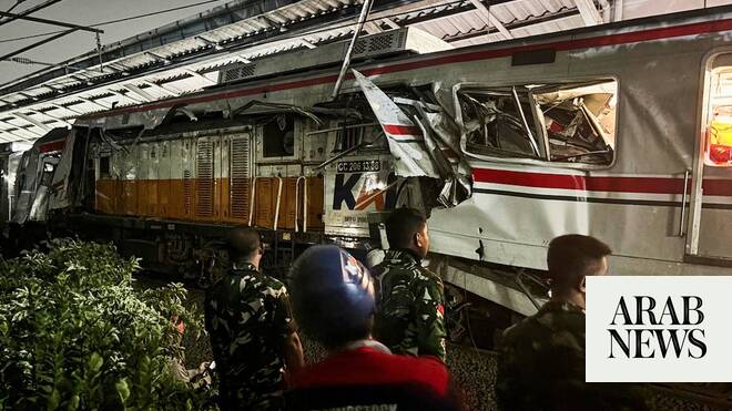 Indonesia train crash toll rises to 14 as rescuers work to remove trapped passengers