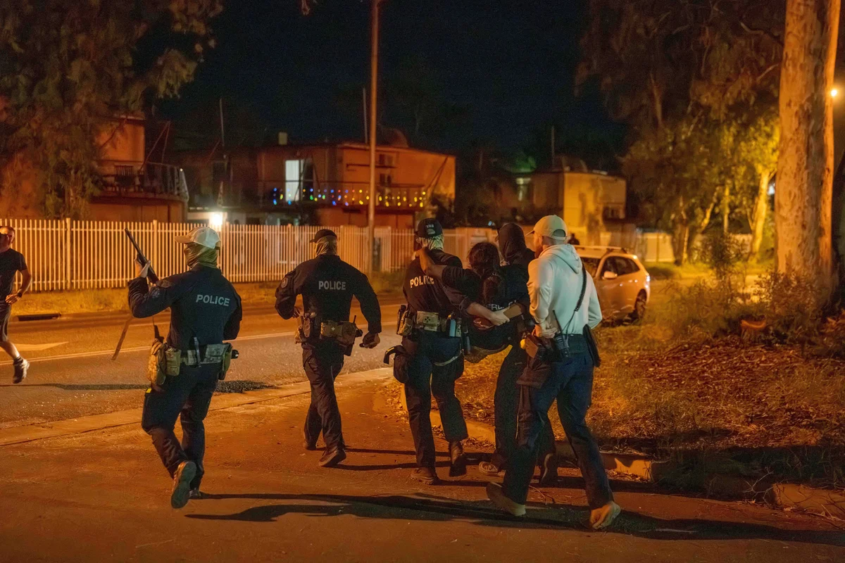 Violence in Australian town as man arrested over death of Indigenous girl