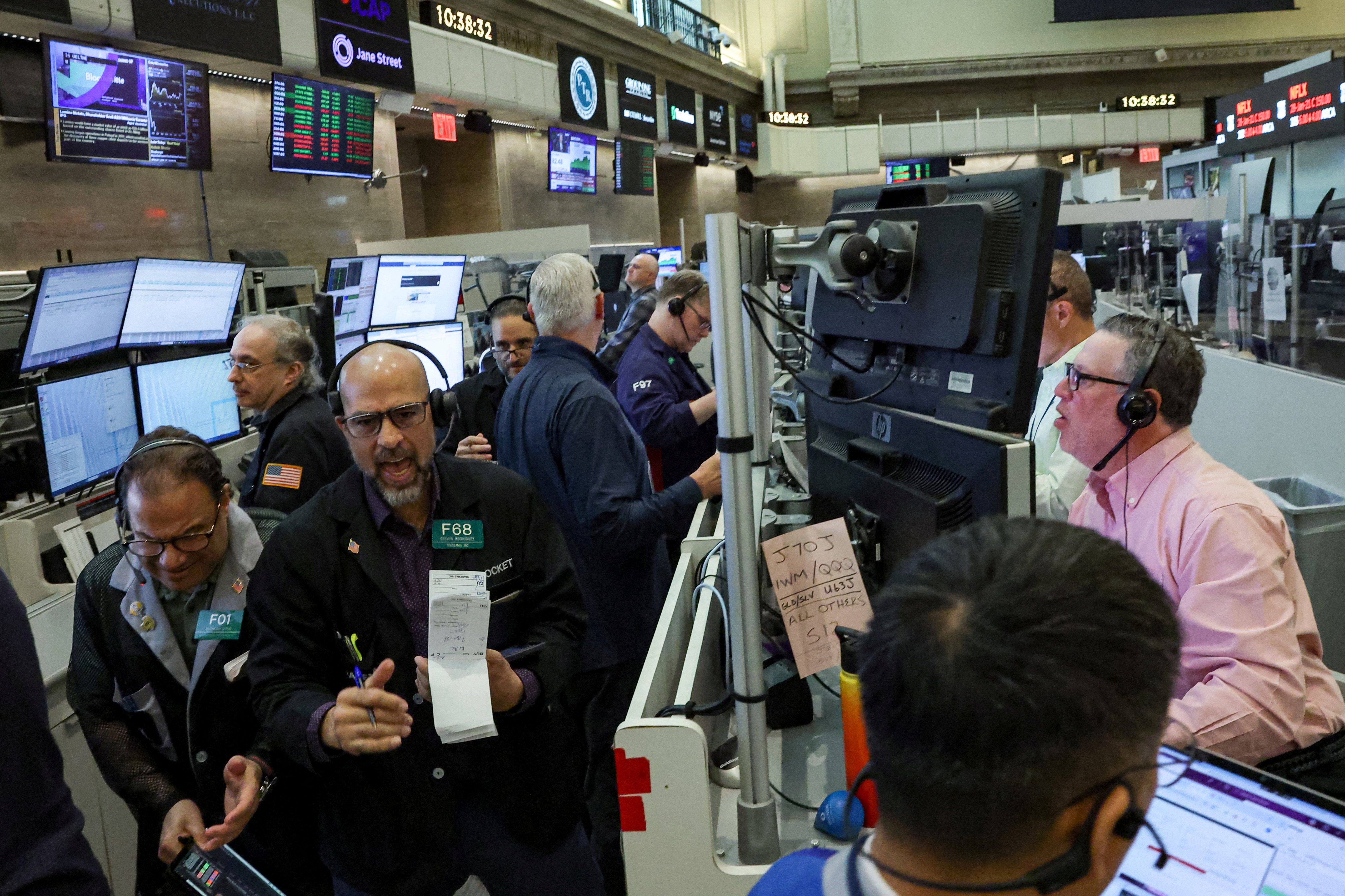 Nasdaq hits record as AI chip stocks surge