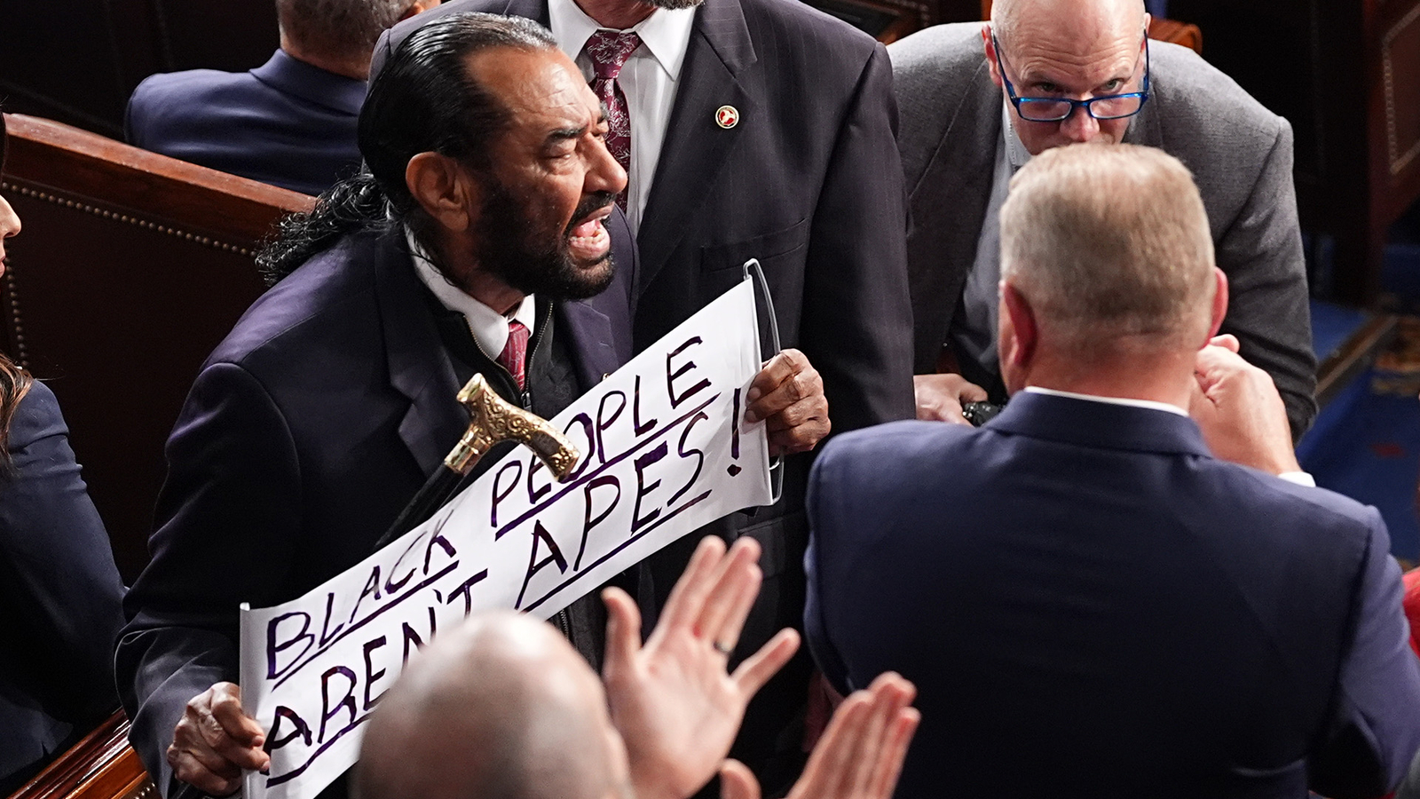 Rep. Al Green is escorted from the chamber as Republicans chant 'USA'