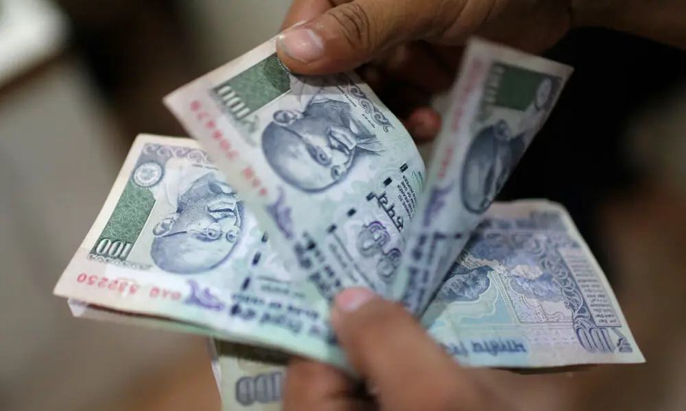 Indian rupee falls most in two weeks as oil spikes on US move to blockade Iran ports
