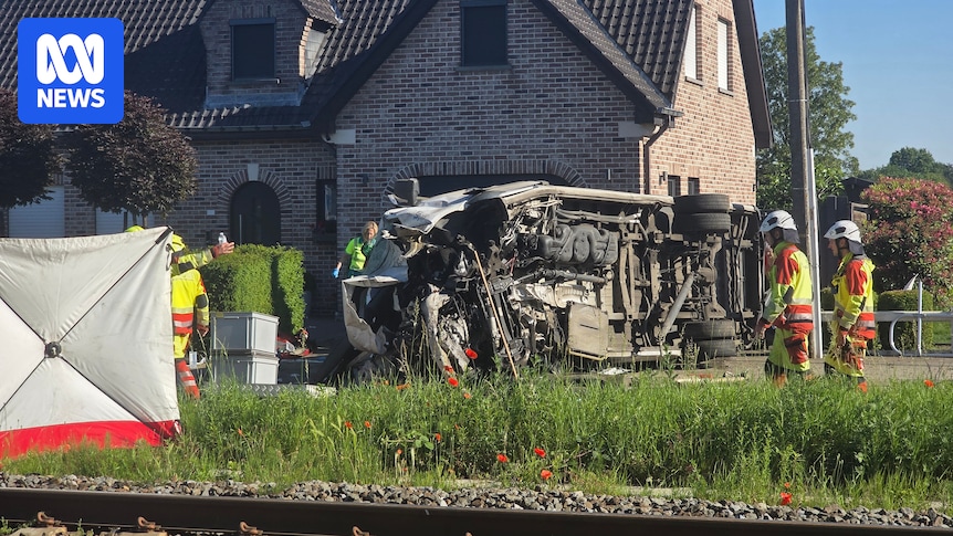 Four people, including two school children, killed in collision between train and school bus in Belgium