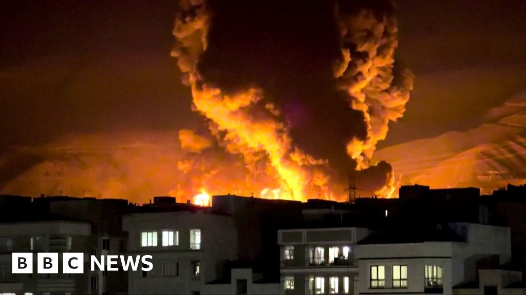 Watch: Huge flames in Tehran after air strikes on oil depots