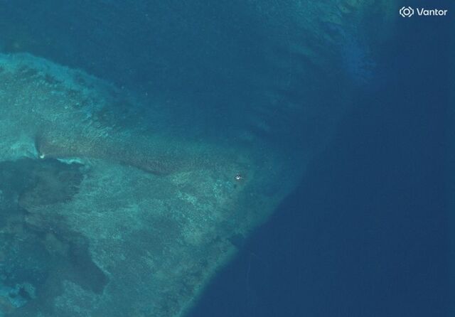 Exclusive-Satellite images show suspected structure at disputed South China Sea atoll, but later gone