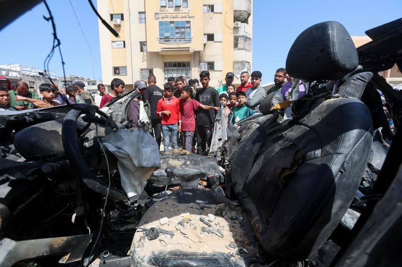 Israeli strikes in Gaza kill three, medics say, testing fragile ceasefire
