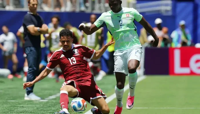 Qatar hail first World Cup point after late header stuns Switzerland in 1-1 draw