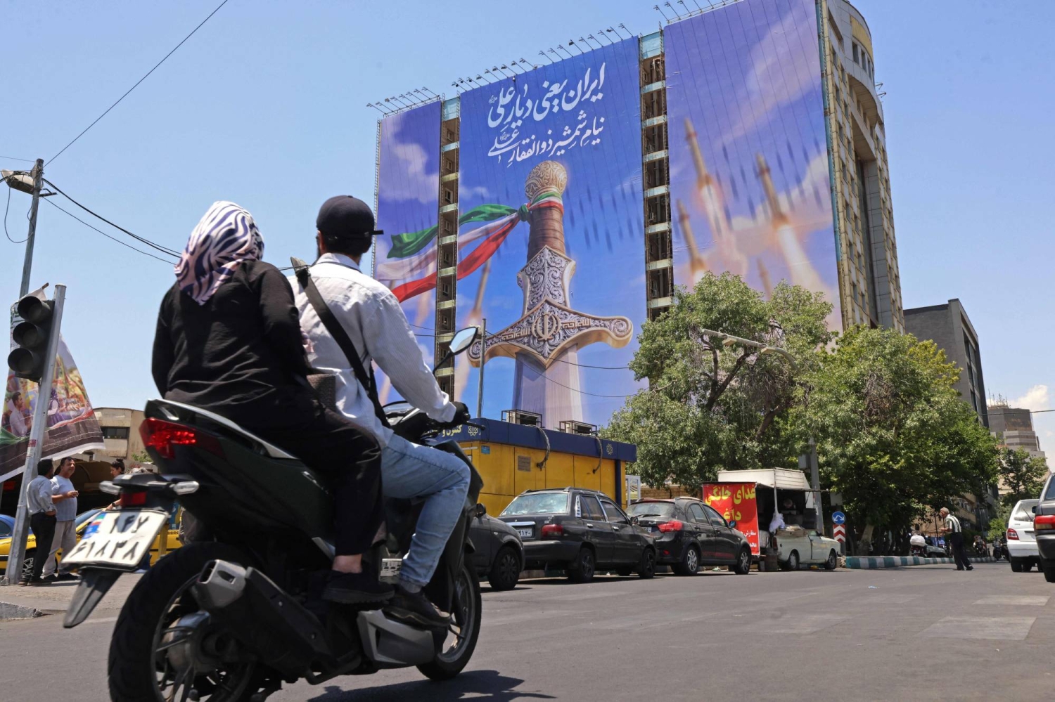 Iran peace deal looms while new military action flares near Strait of Hormuz
