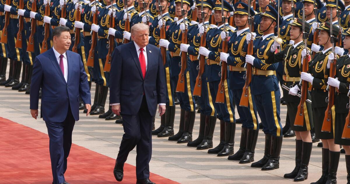 China’s Xi, warning of a clash, tells Trump: 'We must make it work'