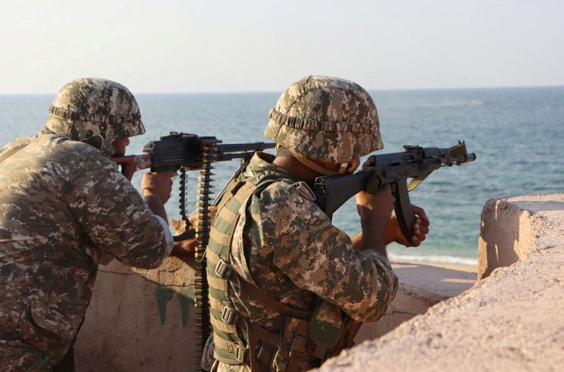 Iran's Revolutionary Guards take wartime lead, ensuring harder line, sources say