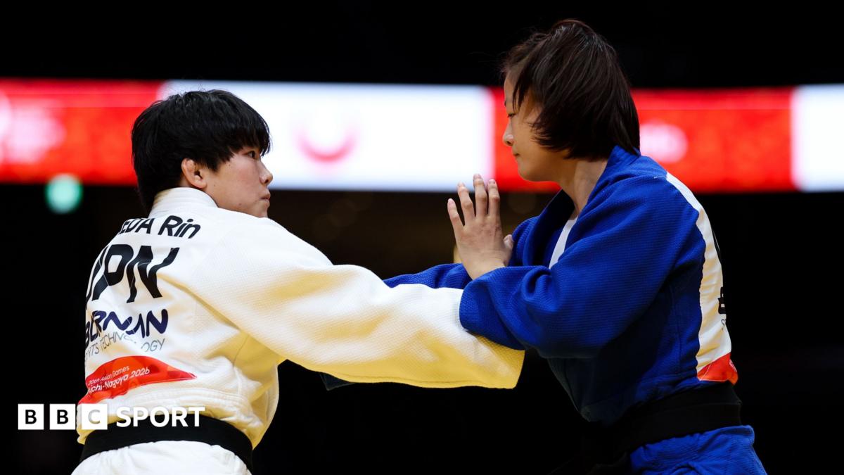 China's Tang disqualified after alleged bite