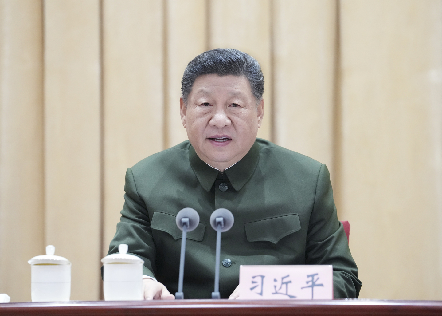 Xi reaffirms 'One China' policy in rare meeting with Taiwan's main opposition leader