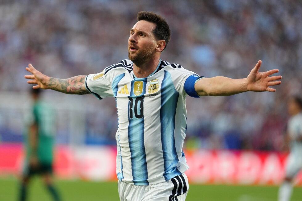 Lionel Messi ties men's World Cup goals record with a hat trick as Argentina tops Algeria