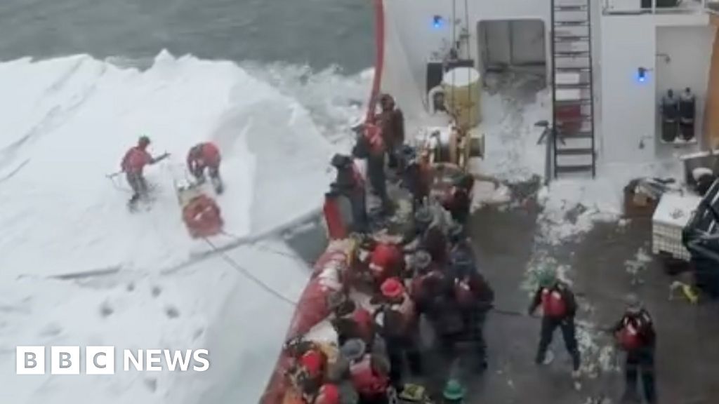 Coast Guard rescues snowmobile operator stranded on ice