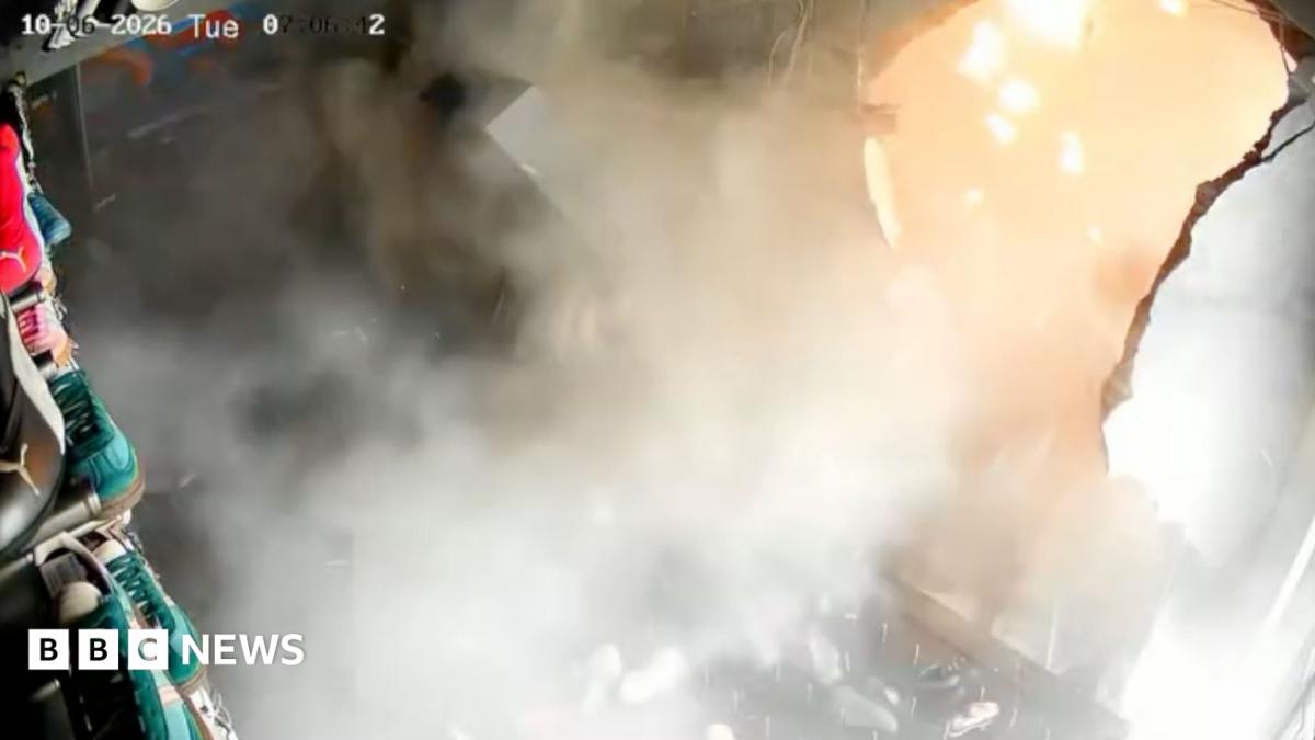 Watch: Moment Indonesian shoe shop is torn apart by explosion