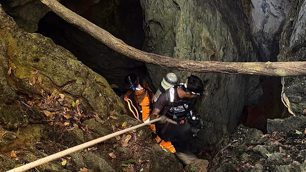 Five of seven people trapped in flooded Laos cave for more than a week found alive, rescuers say