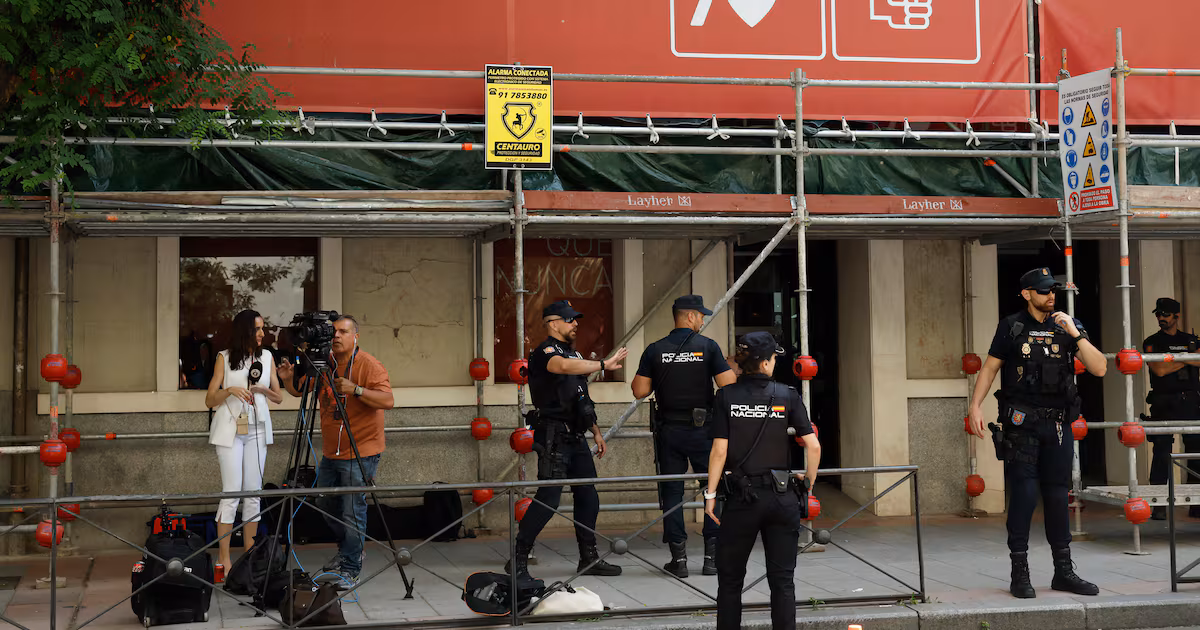 Police call to offices of Spain’s ruling Socialists as part of inquiry into former party official