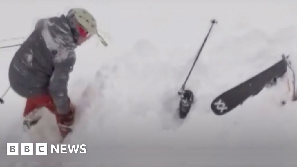 Watch dramatic rescue of skier buried in deep snow