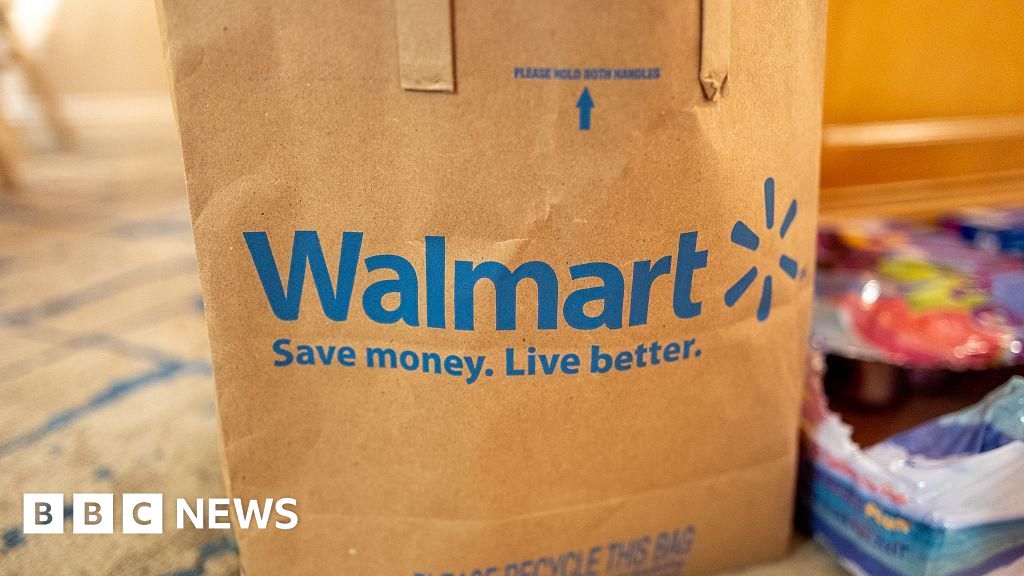 Walmart to pay $100m over claims it misled drivers over pay
