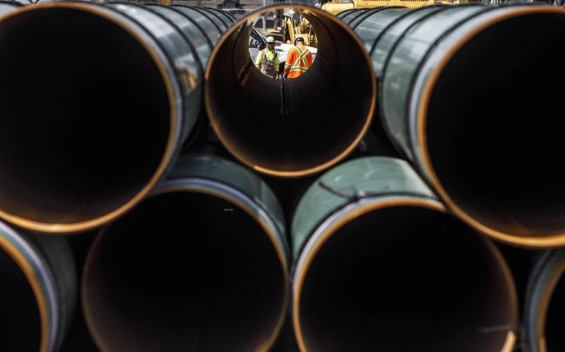 Trump signs order authorizing oil pipeline project partially reviving Keystone XL