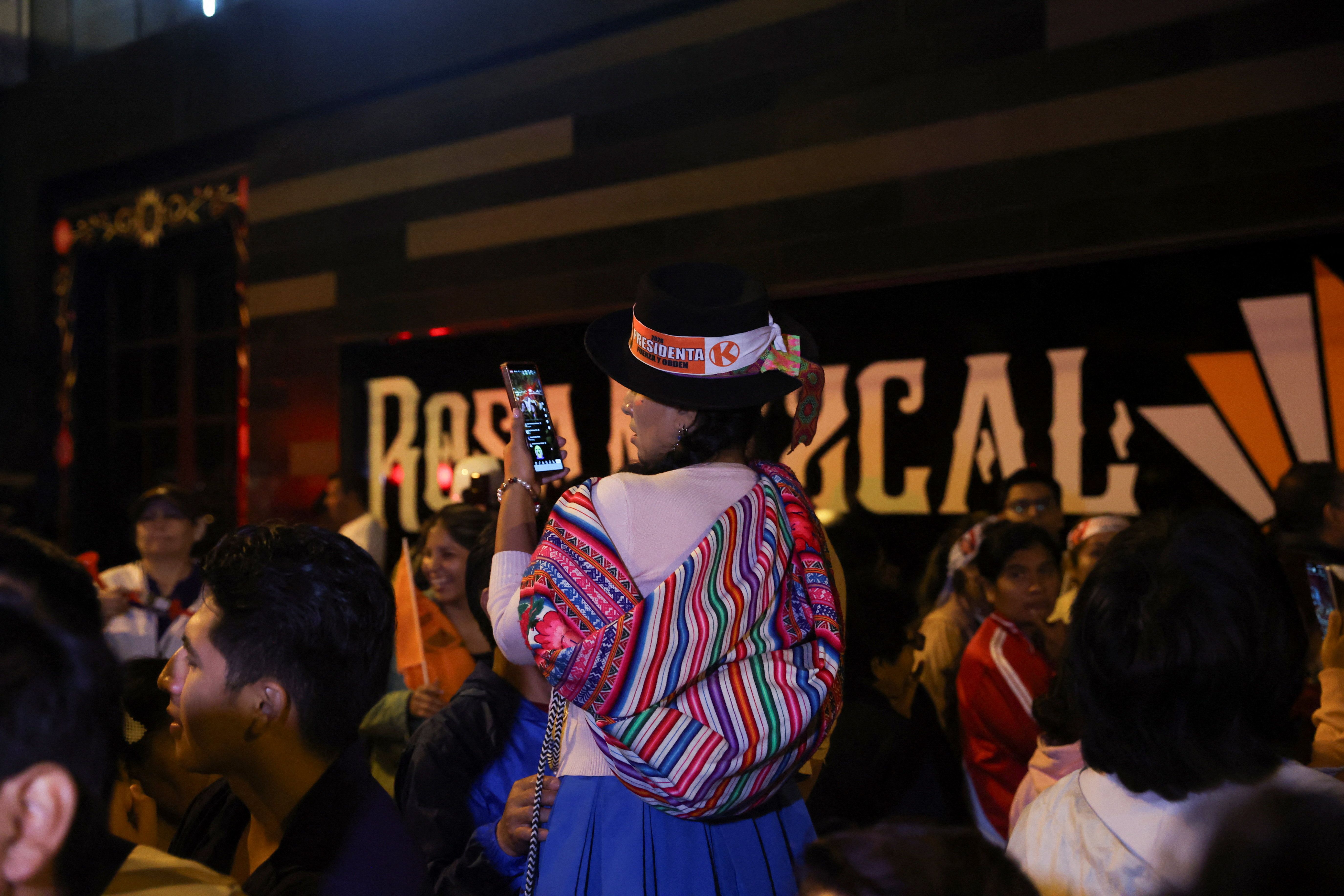 Peru's presidential election runoff is too close to call, exit poll shows